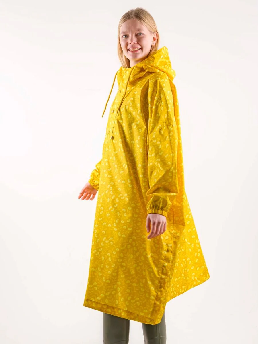 Danedream Drops Poncho Dunkelgelb Fleuri