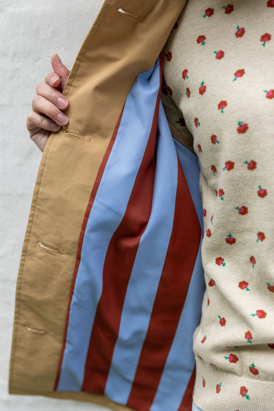 Danefæ Danebusiness beige tussenjas voor dames met opgerolde mouwen