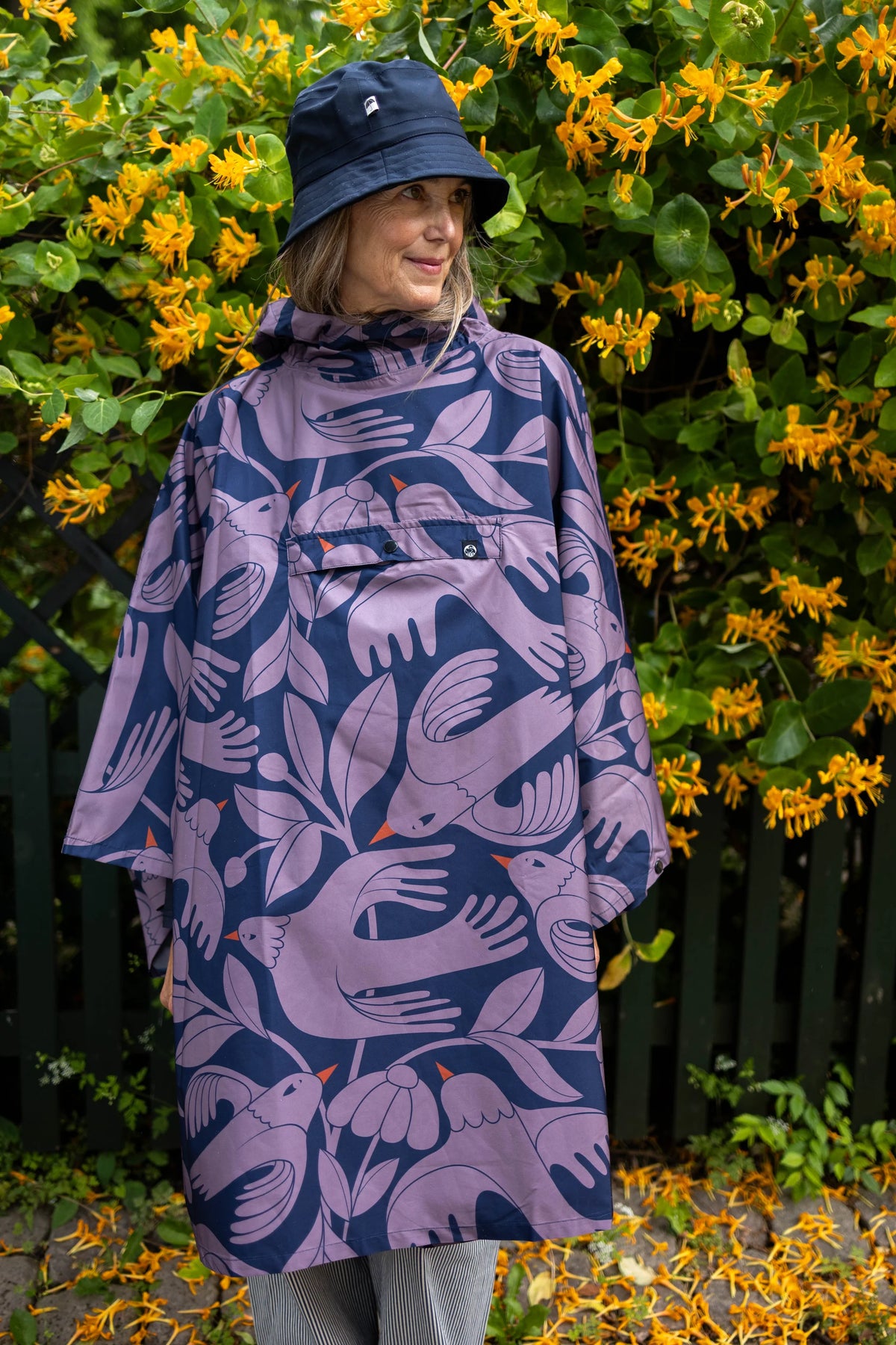 Danefæ Danepackit opvouwbare regenponcho navy Birdieup – productfoto 1